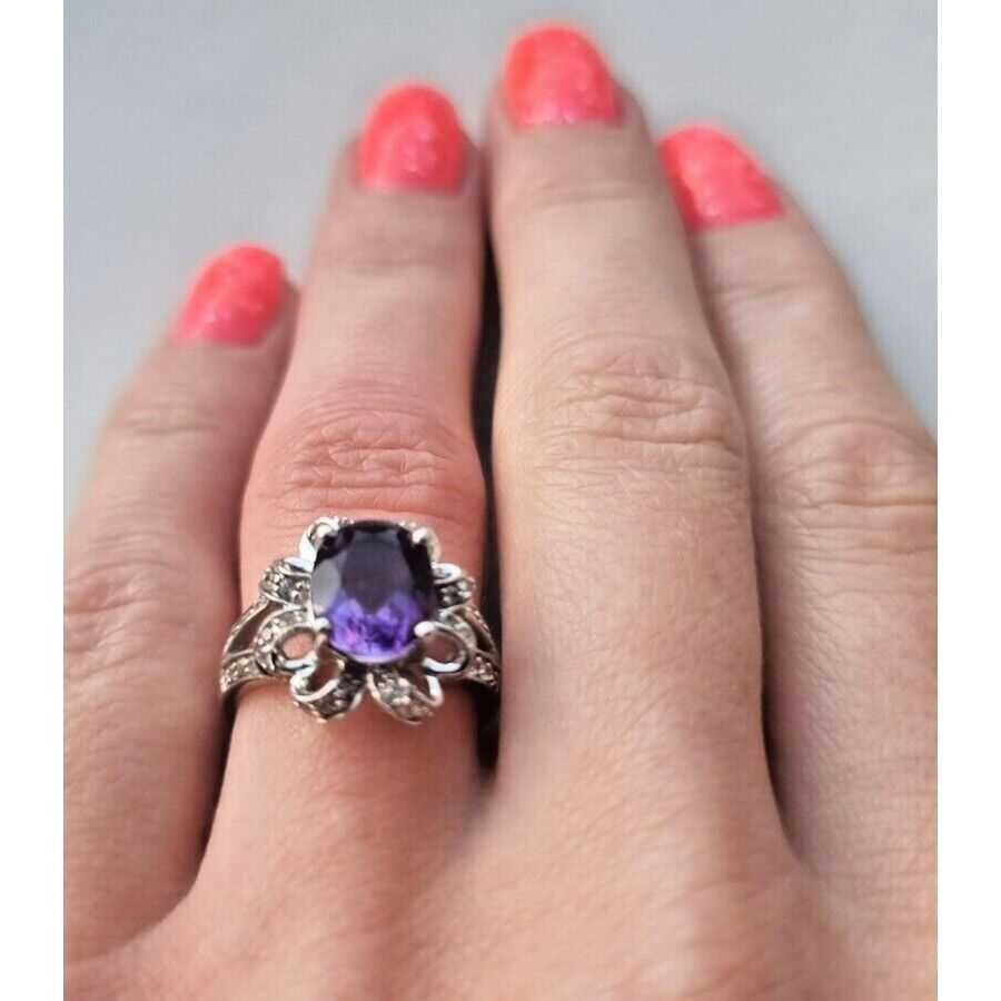 925 STERLING SILVER OVAL  10x 7.6 mm. AMETHYST AND CZ RING SIZE 6.25 AT