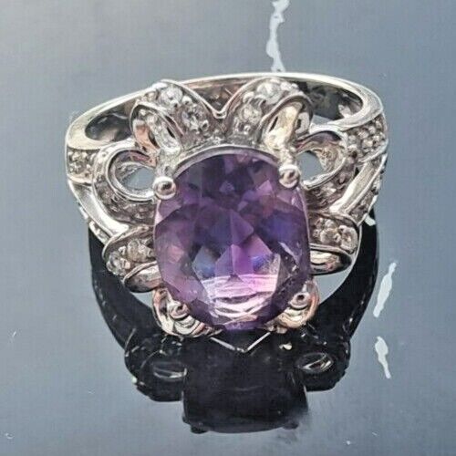 925 STERLING SILVER OVAL  10x 7.6 mm. AMETHYST AND CZ RING SIZE 6.25 AT