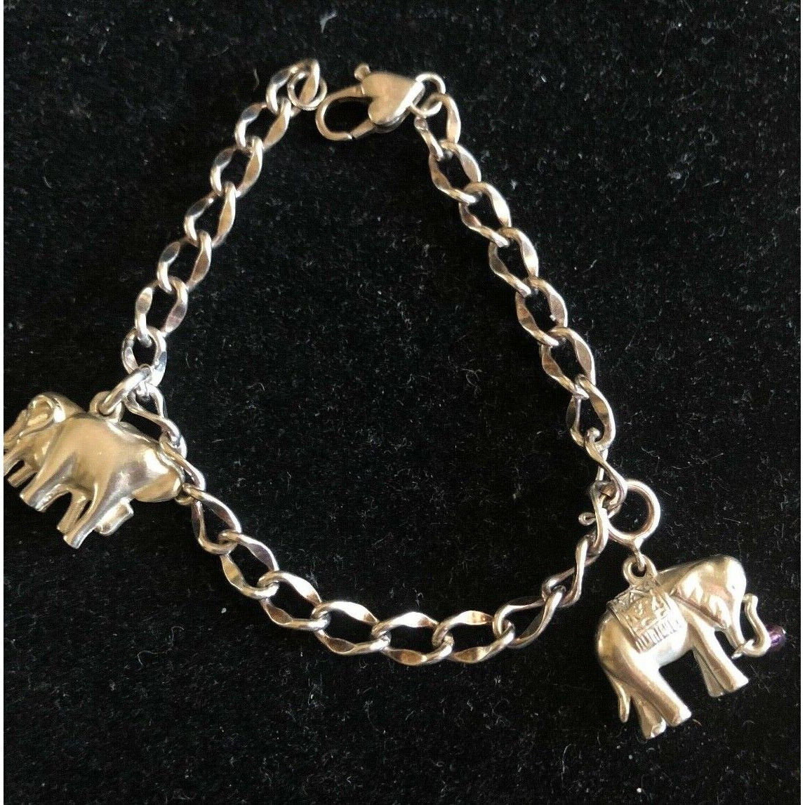 STERLING SILVER ELEPHANTS CHARM BRACELET. SKY