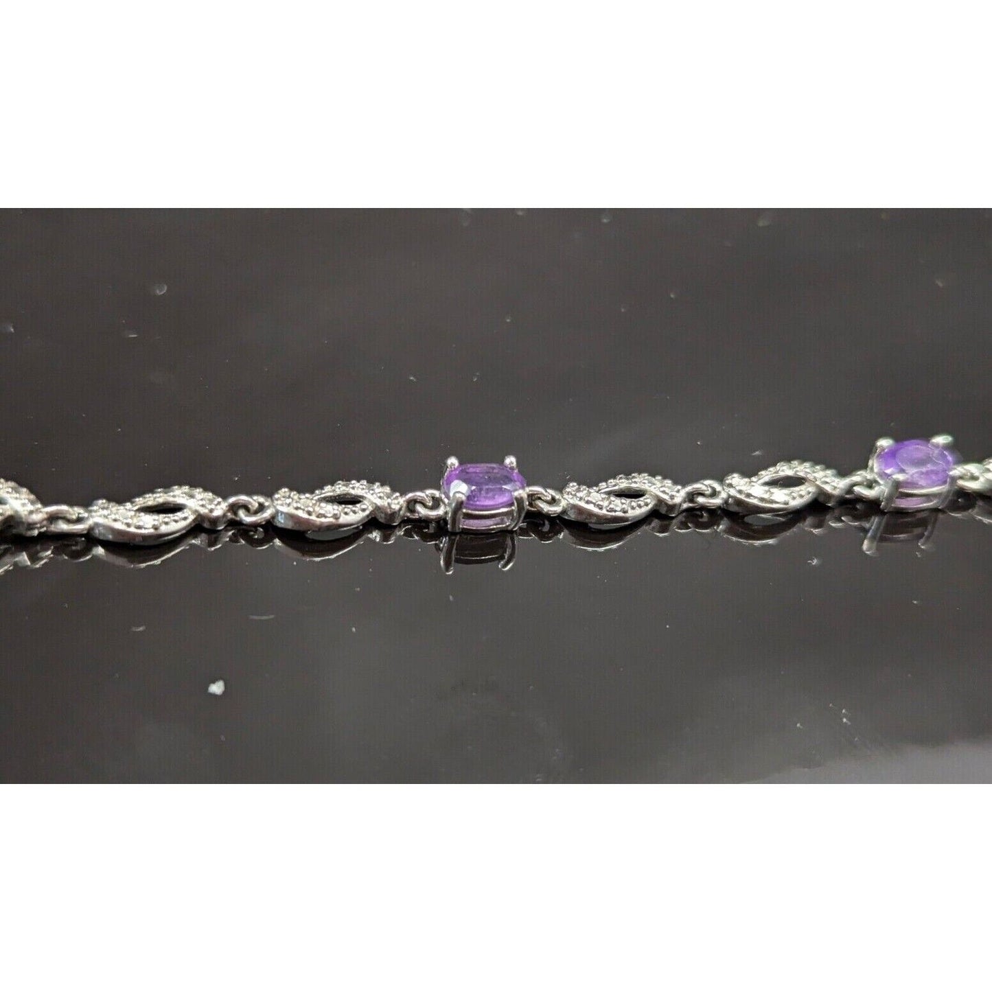 925 sterling silver 5x4 mm. oval amethyst bracelet . 7.25 inch AT