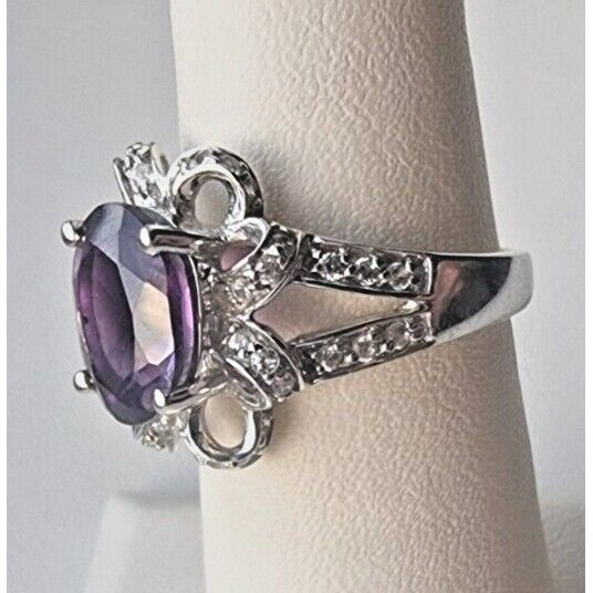 925 STERLING SILVER OVAL  10x 7.6 mm. AMETHYST AND CZ RING SIZE 6.25 AT