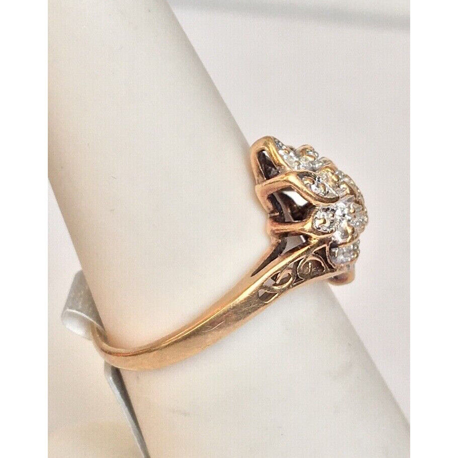 YELLOW GOLD "LOVE STORY" 0.15 CT DIAMOND CLUSTER RING. SIZE 6.75 SKY