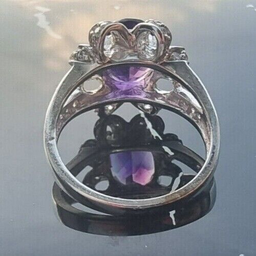 925 STERLING SILVER OVAL  10x 7.6 mm. AMETHYST AND CZ RING SIZE 6.25 AT