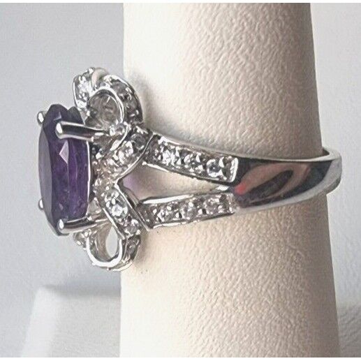 925 STERLING SILVER OVAL  10x 7.6 mm. AMETHYST AND CZ RING SIZE 6.25 AT