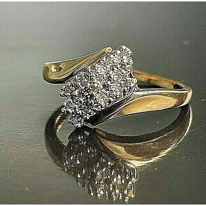 YELLOW GOLD & DIAMOND BY-PASS DESIGN CLUSTER RING SIZE 7 SKY