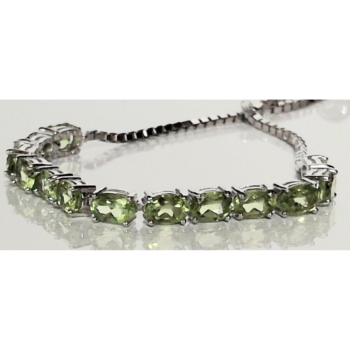 925 STERLING SILVER AND PERIDOT TENNIS  BOLO BRACELET SKY