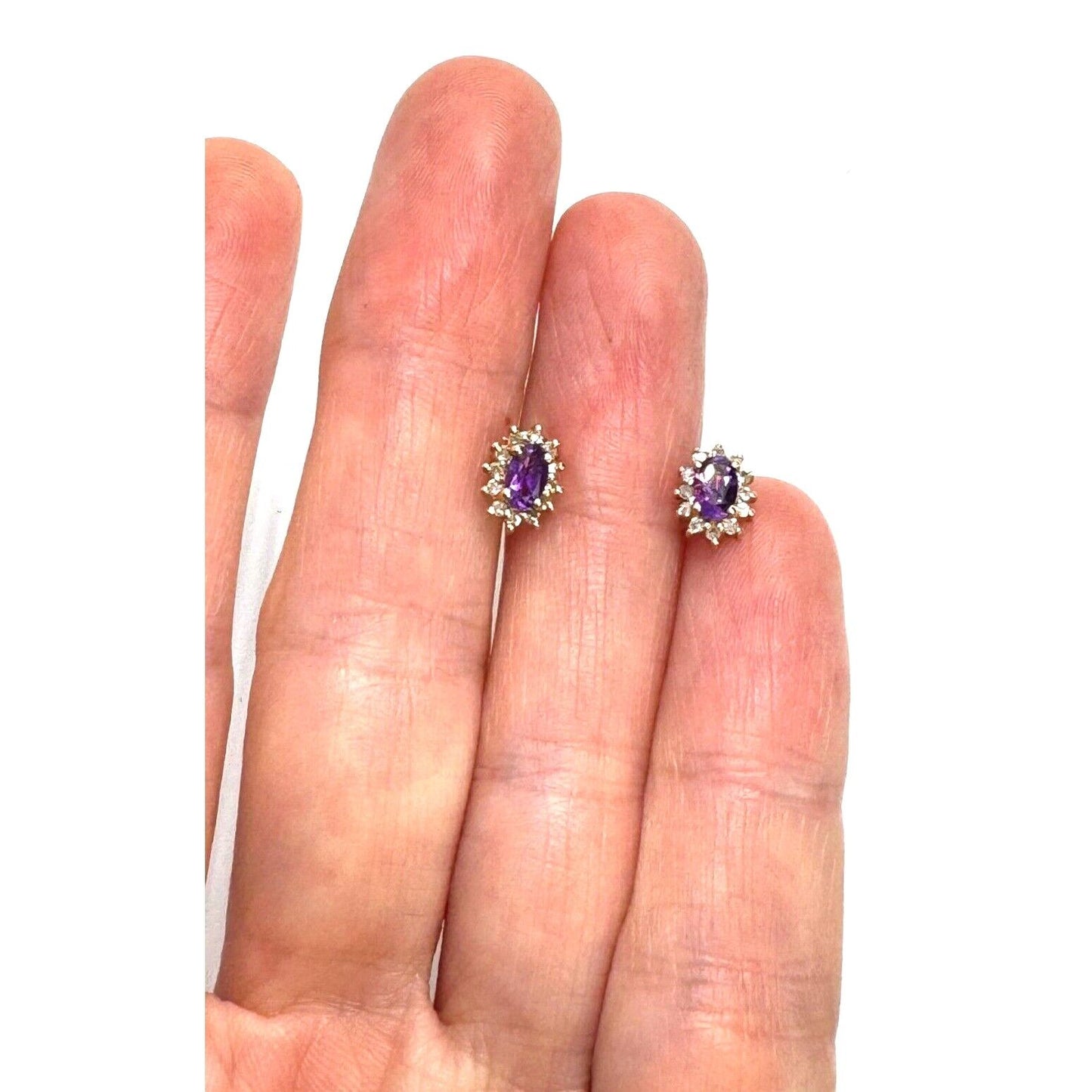 T & C 14K YELLOW GOLD AMETHYST AND DIAMOND STUD EARRINGS SKY