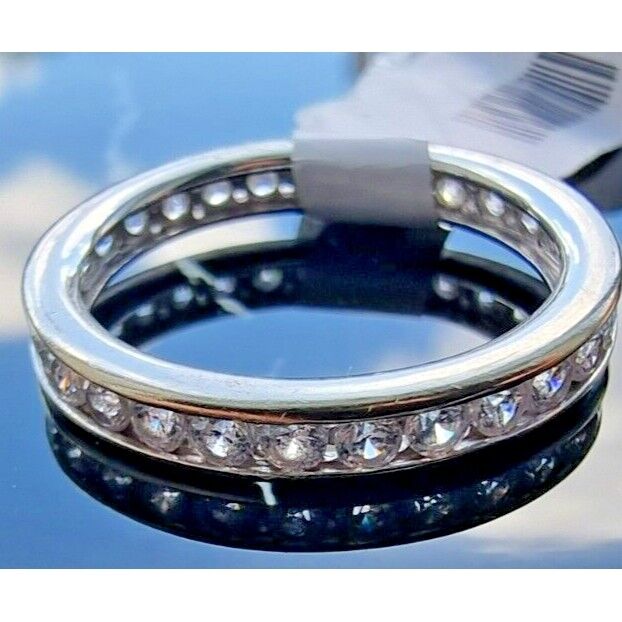 10K  WHITE GOLD  ETERNITY  ROUND CZ BAND RING SIZE 6 AT