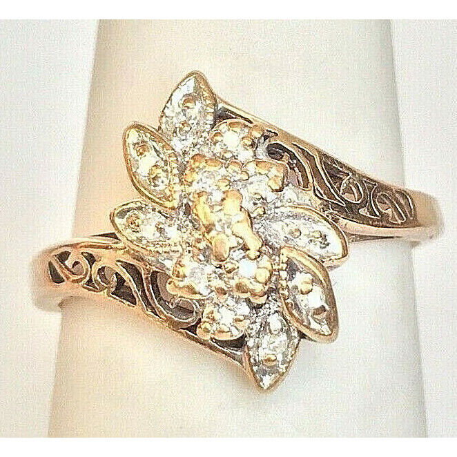 YELLOW GOLD "LOVE STORY" 0.15 CT DIAMOND CLUSTER RING. SIZE 6.75 SKY