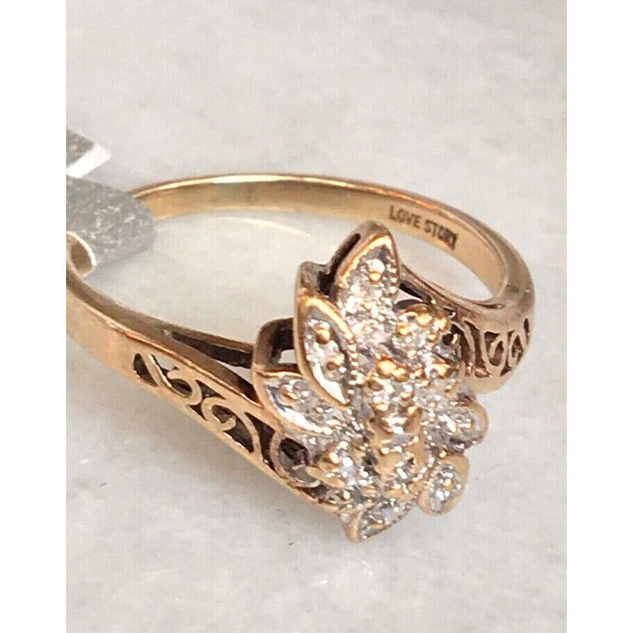 YELLOW GOLD "LOVE STORY" 0.15 CT DIAMOND CLUSTER RING. SIZE 6.75 SKY