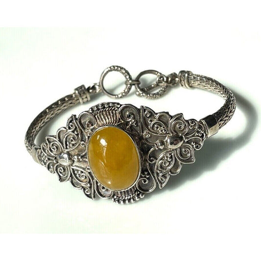 BEAUTIFUL ORNATE 925 STERLING SILVER AND HONEY AMBER BRACELET SKY