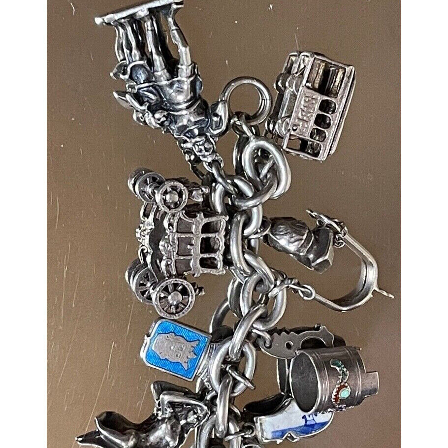 MASSIVE 925 STERLING SILVER  CHARM BRACELET. 20 CHARMS. 101.9 GRAMS SKY