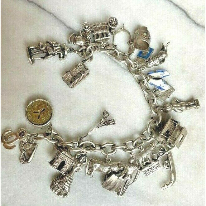 MASSIVE 925 STERLING SILVER  CHARM BRACELET. 20 CHARMS. 101.9 GRAMS SKY