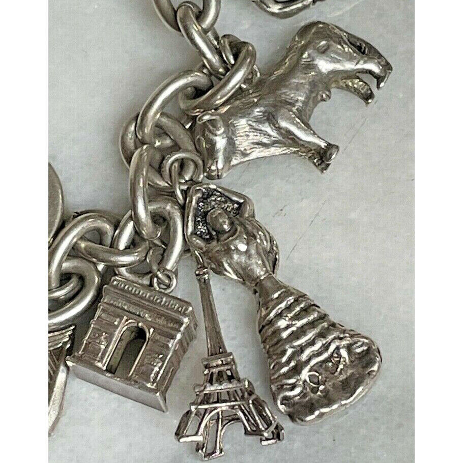 MASSIVE 925 STERLING SILVER  CHARM BRACELET. 20 CHARMS. 101.9 GRAMS SKY