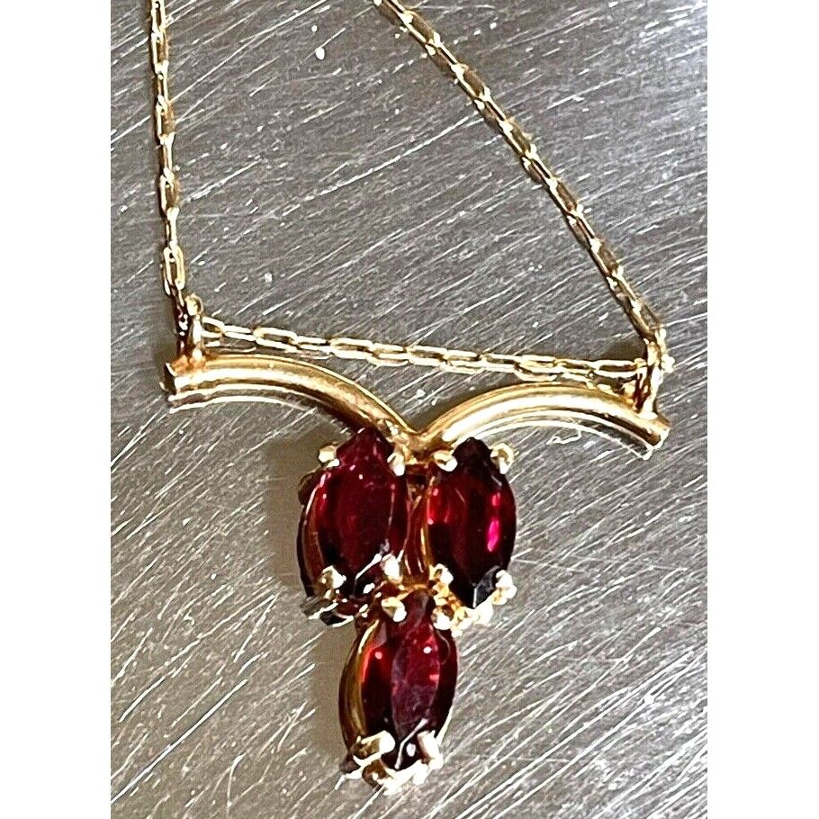 14K YELLOW GOLD AND GARNET NECKLACE SKY