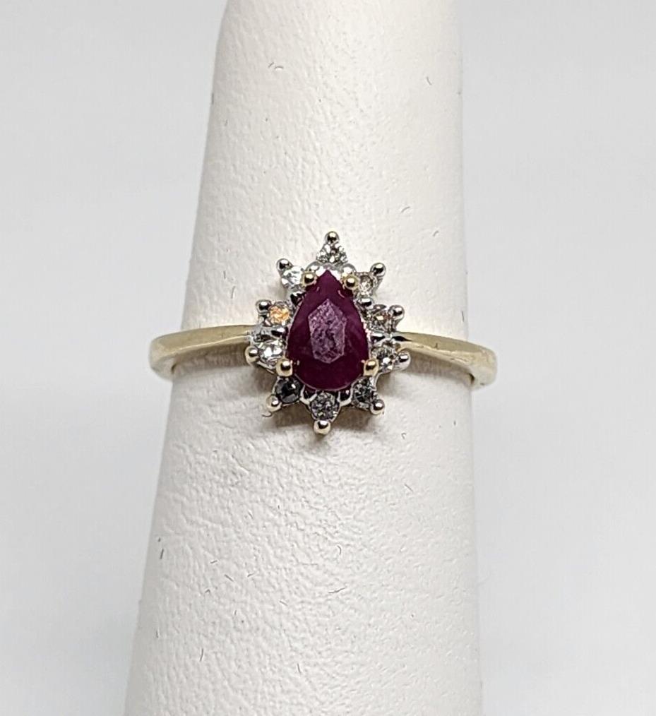 10K YELLOW GOLD RUBY & DIAMONDS RING  SIZE 4