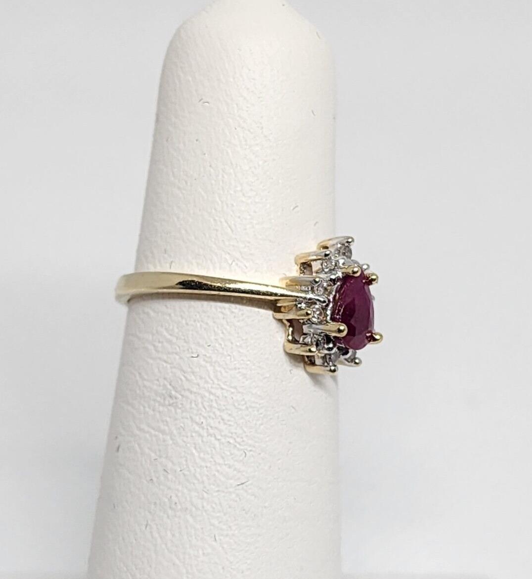 10K YELLOW GOLD RUBY & DIAMONDS RING  SIZE 4