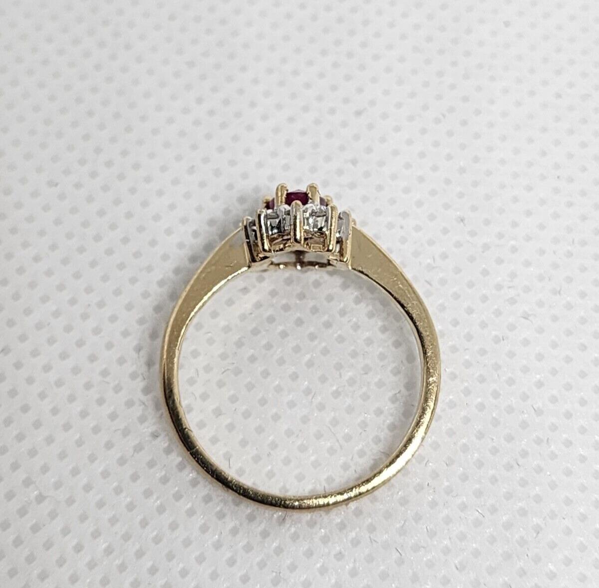 10K YELLOW GOLD RUBY & DIAMONDS RING  SIZE 4