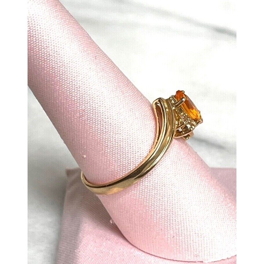 YELLOW GOLD CITRINE AND DIAMONDBYPASS DESIGN RING SIZE 8 SKY