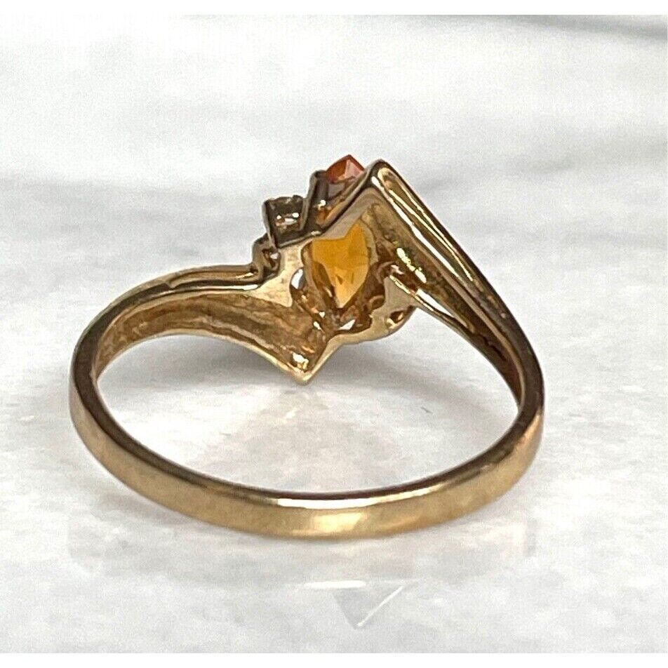 YELLOW GOLD CITRINE AND DIAMONDBYPASS DESIGN RING SIZE 8 SKY