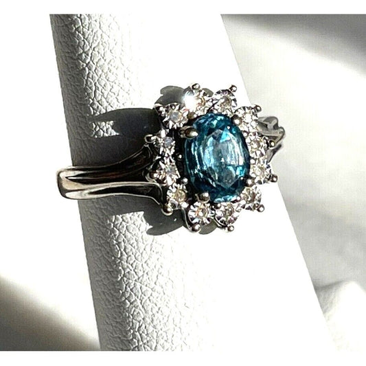 10k WHITE GOLD BLUE TOPAZ AND DIAMOND RING SIZE 6 SKY