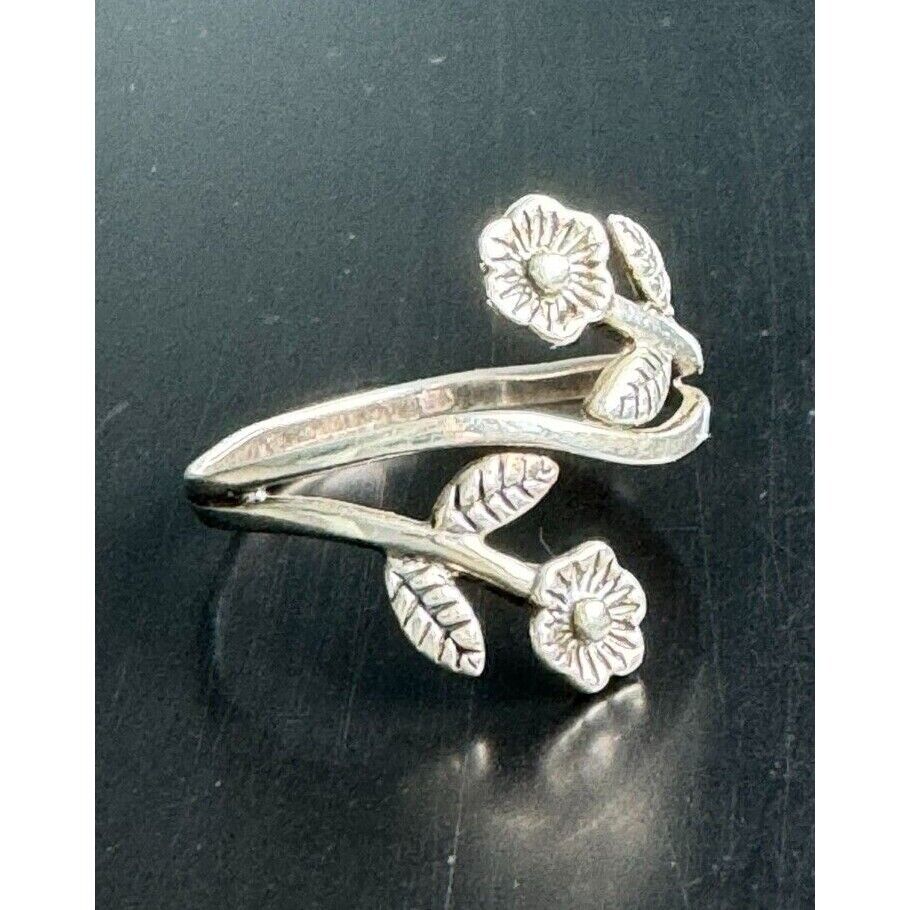 925 STERLING SILVER BYPASS DESIGN FLOWER RING SIZE 7.5 SKY