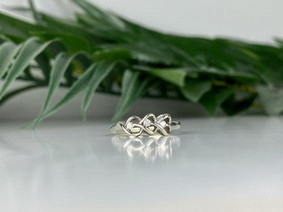 10K White Gold Diamonds "Hearts" Ring Size 7