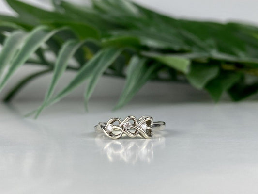 10K White Gold Diamonds "Hearts" Ring Size 7