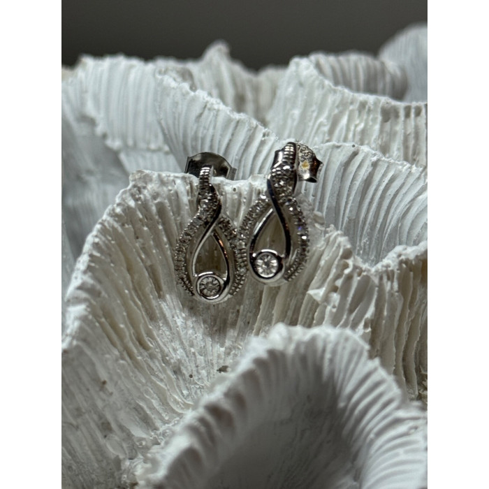 INTERWOVEN 925 STERLING SILVER WHITE TOPAZ EARRINGS LENGTH 0.6 in