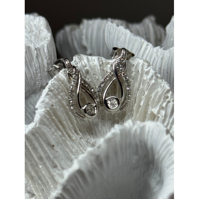 INTERWOVEN 925 STERLING SILVER WHITE TOPAZ EARRINGS LENGTH 0.6 in
