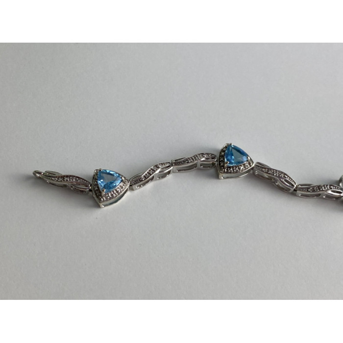 925 STERLING SILVER BLUE TOPAZ BRACELET SIZE 7 IN