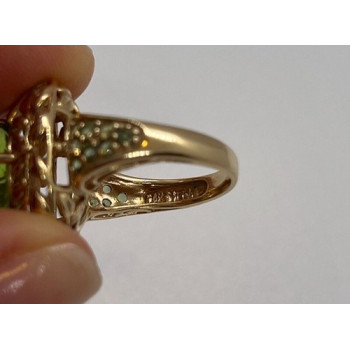 14K YELLOW GOLD  & PERIDOT RING  SIZE 4.5